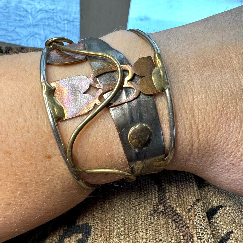 Mixed metal cuff bracelet.
